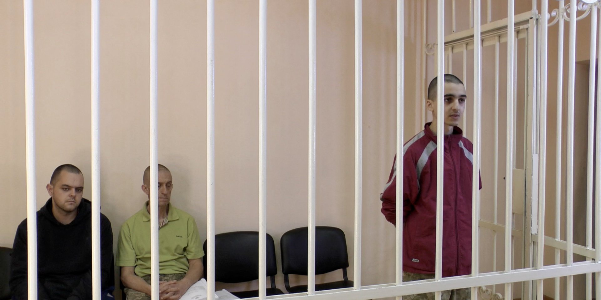 from left: Britons Aiden Aslin, Sean Pinner and Moroccan Brahim Saadun in the courtroom in occupied Donetsk (Photo: Supreme Court of&nbsp;Donetsk People’s Republic/Handout via REUTERS)