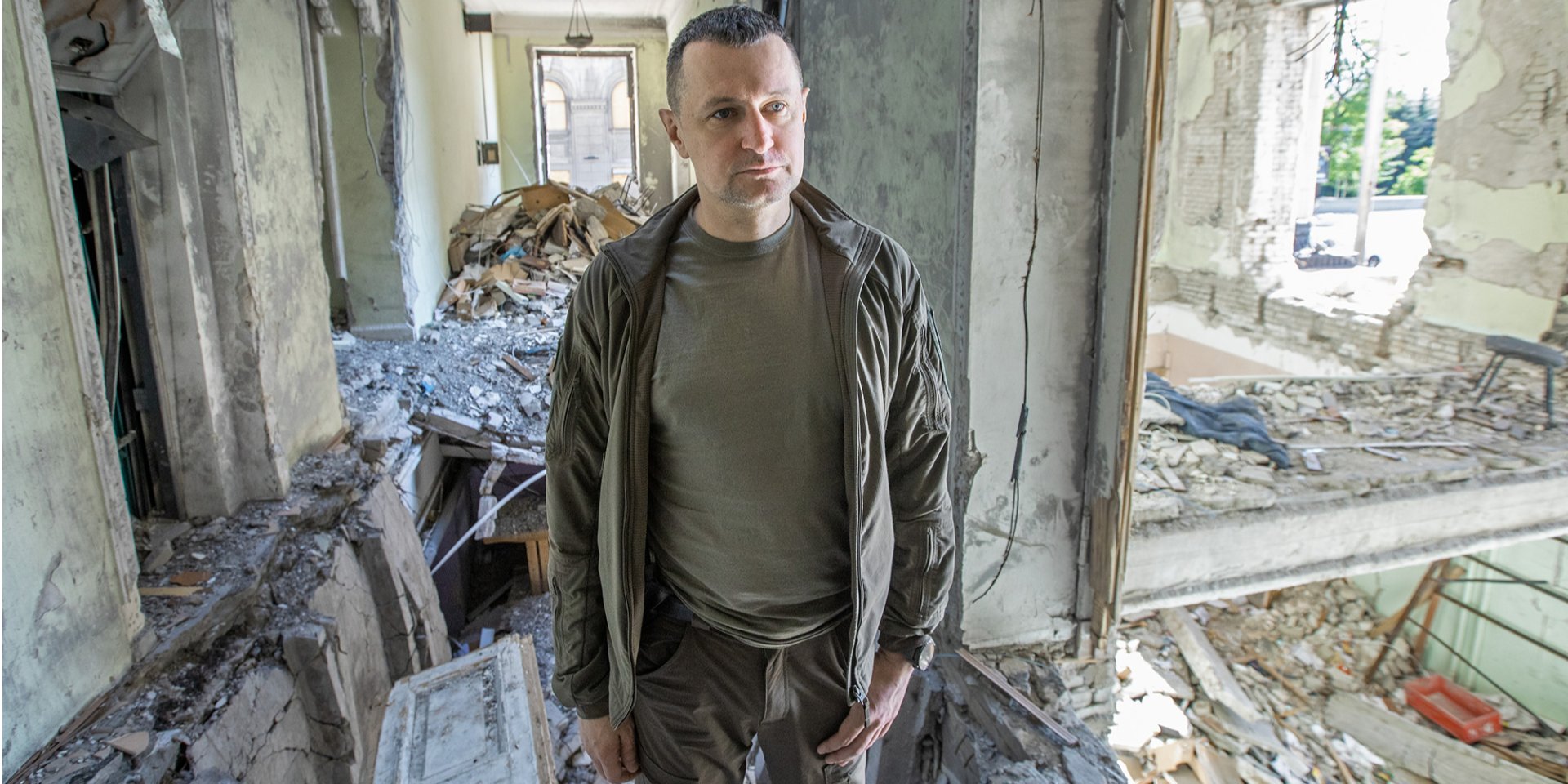 Roman Semenukha, the Deputy Head of the Kharkiv Regional State Administration, in the building of the regional administration destroyed by Russian shelling (Photo: Oleksandr Medvediev / NV)