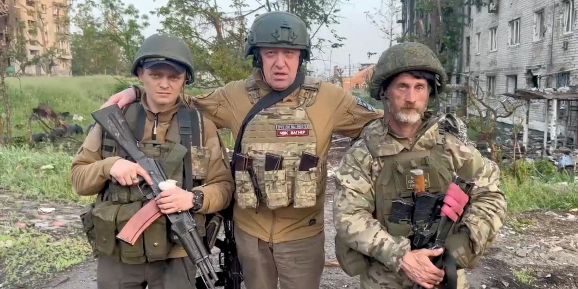 Yevgeny Prigozhin and two of his fighters in Bakhmut, May 25, 2023 (Photo: Press service of&nbsp;Concord/Handout via REUTERS)