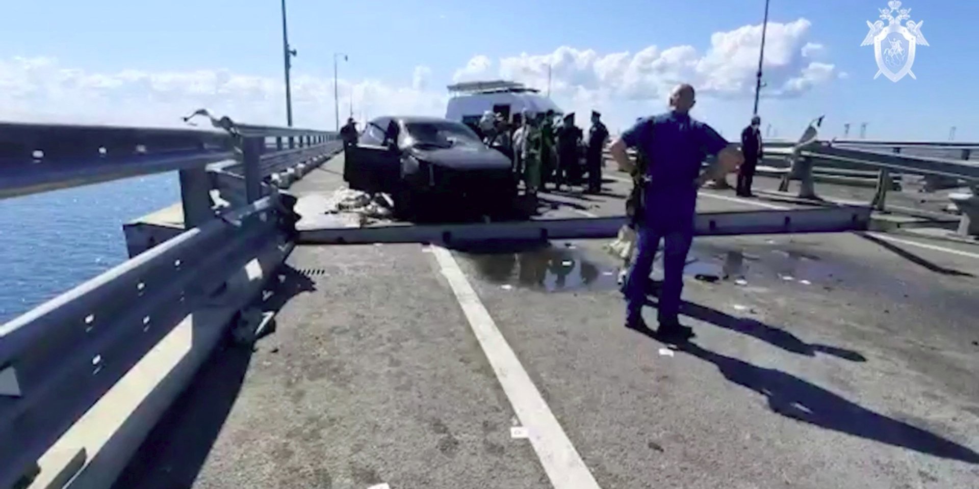 Occupiers inspect the Crimean bridge damaged by the explosion, July 17, 2023 (Photo: Investigative Committee of Russia/Handout via REUTERS)