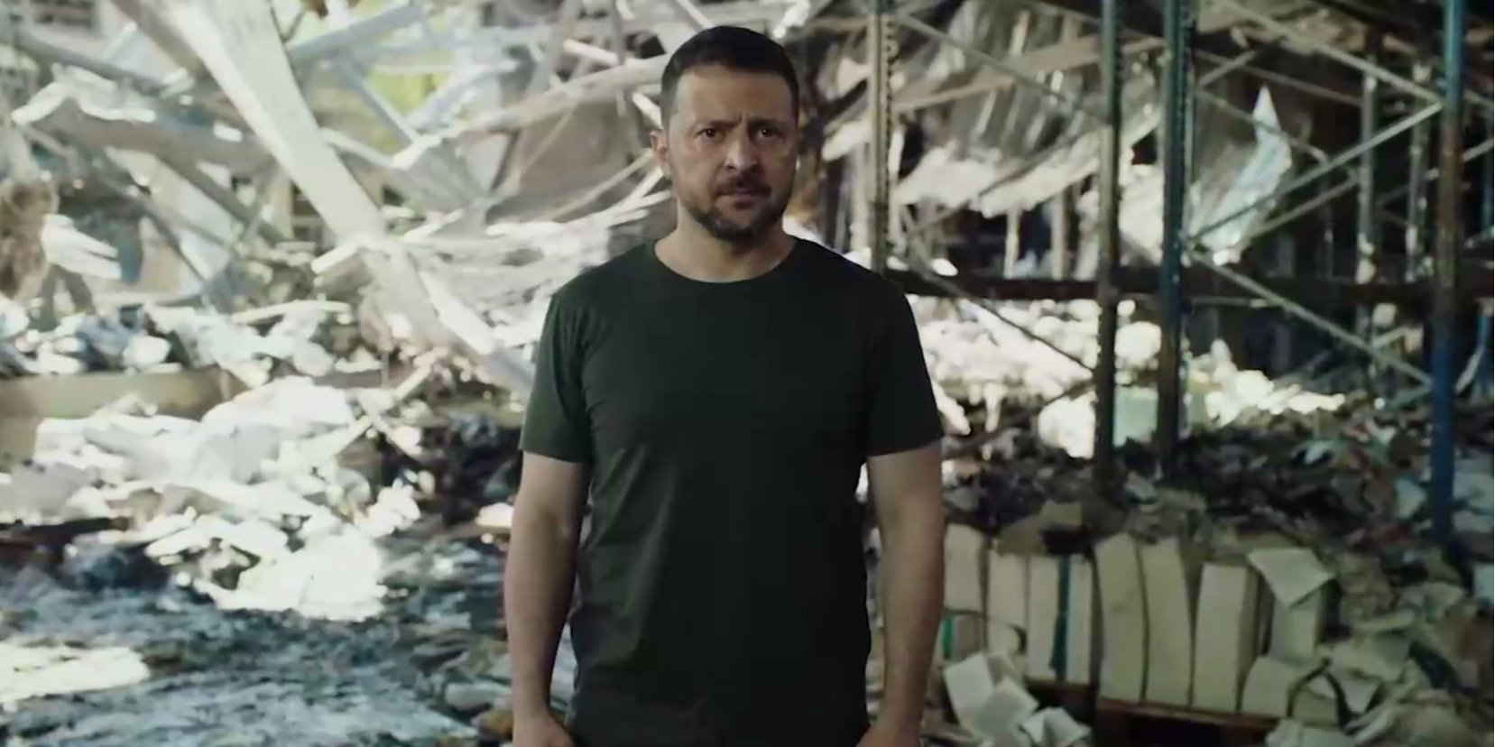 Zelenskyy recorded his video address against the backdrop of a destroyed printing house in Kharkiv (Photo: Screenshot from the video by the Office of the President of Ukraine)