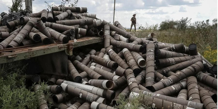 A Ukrainian soldier near a pile of shell casings in Donetsk Oblast, Aug. 15, 2024 (Photo: REUTERS/Oleksandr Klymenko)