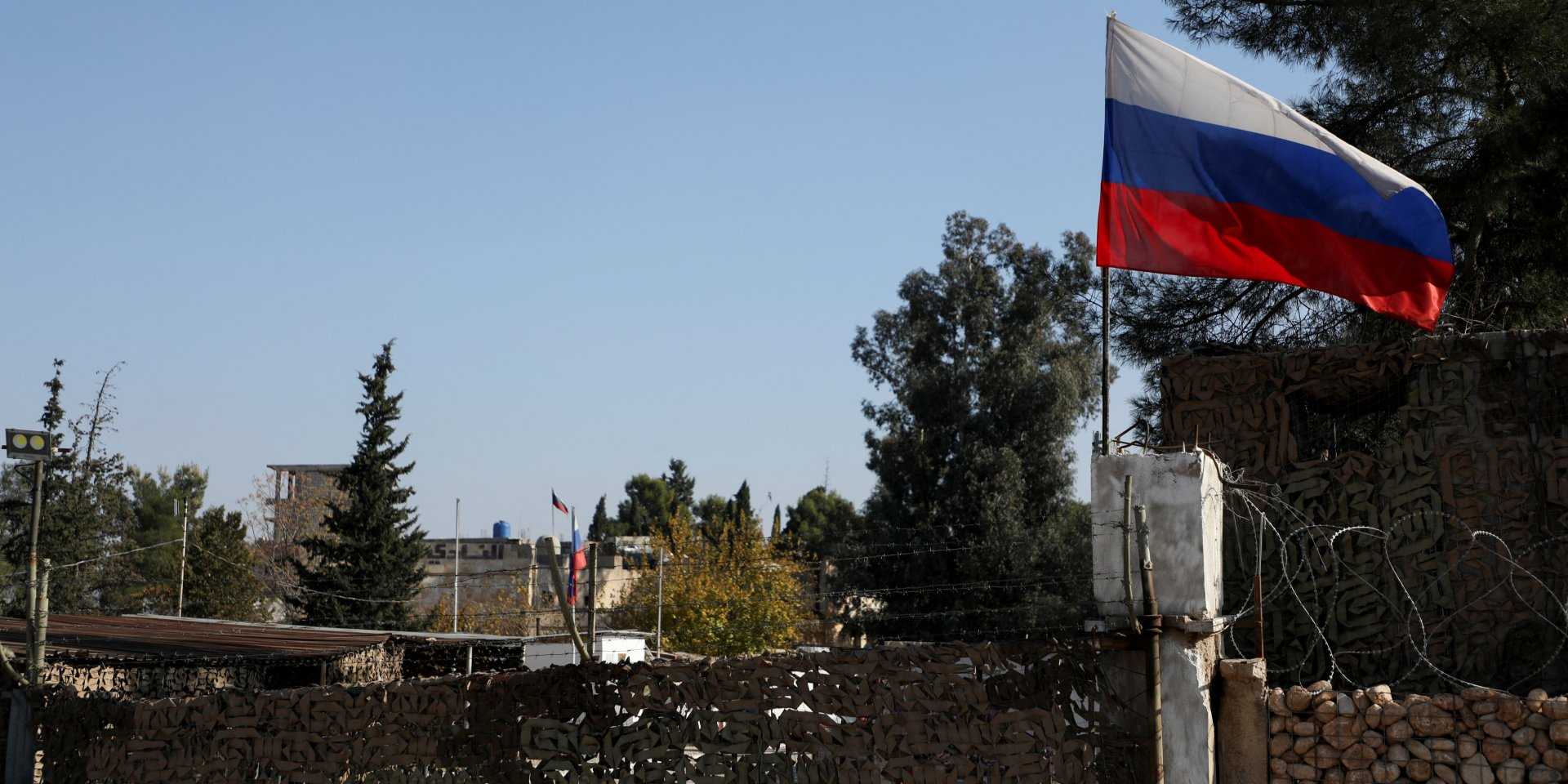 A Russian flag flies near Qamishli International Airport in Syria on December 9, 2024. (Photo: REUTERS/Orhan Qereman)