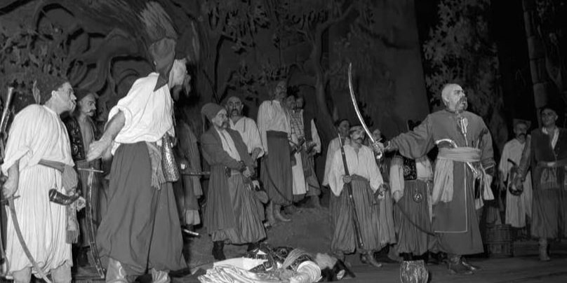 Борис Гмиря виконує партію Тараса Бульби (праворуч із шаблею) в однойменній опері Миколи Лисенка. Київ, січень 1960 року (Фото: ЦДАМЛМ України)