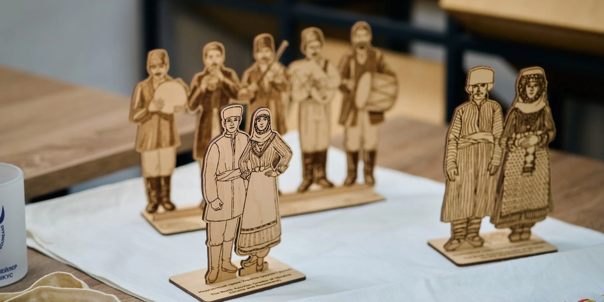 Wooden figurines depicting traditional clothing and musicians of the North Azovian Greeks (Photo: North Azovian Greeks: Urums and Roumeans NGO)