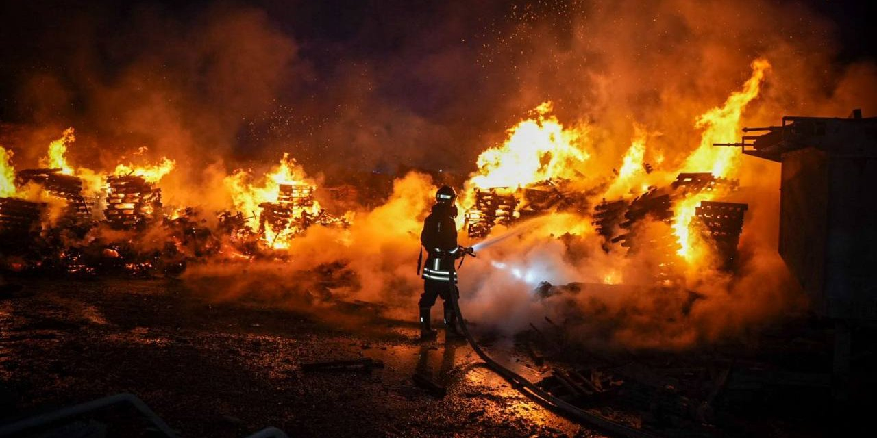A rescuer extinguishes a fire that broke out after a Russian attack on Odesa Oblast. (Photo: State Emergency Service of Ukraine / Telegram)