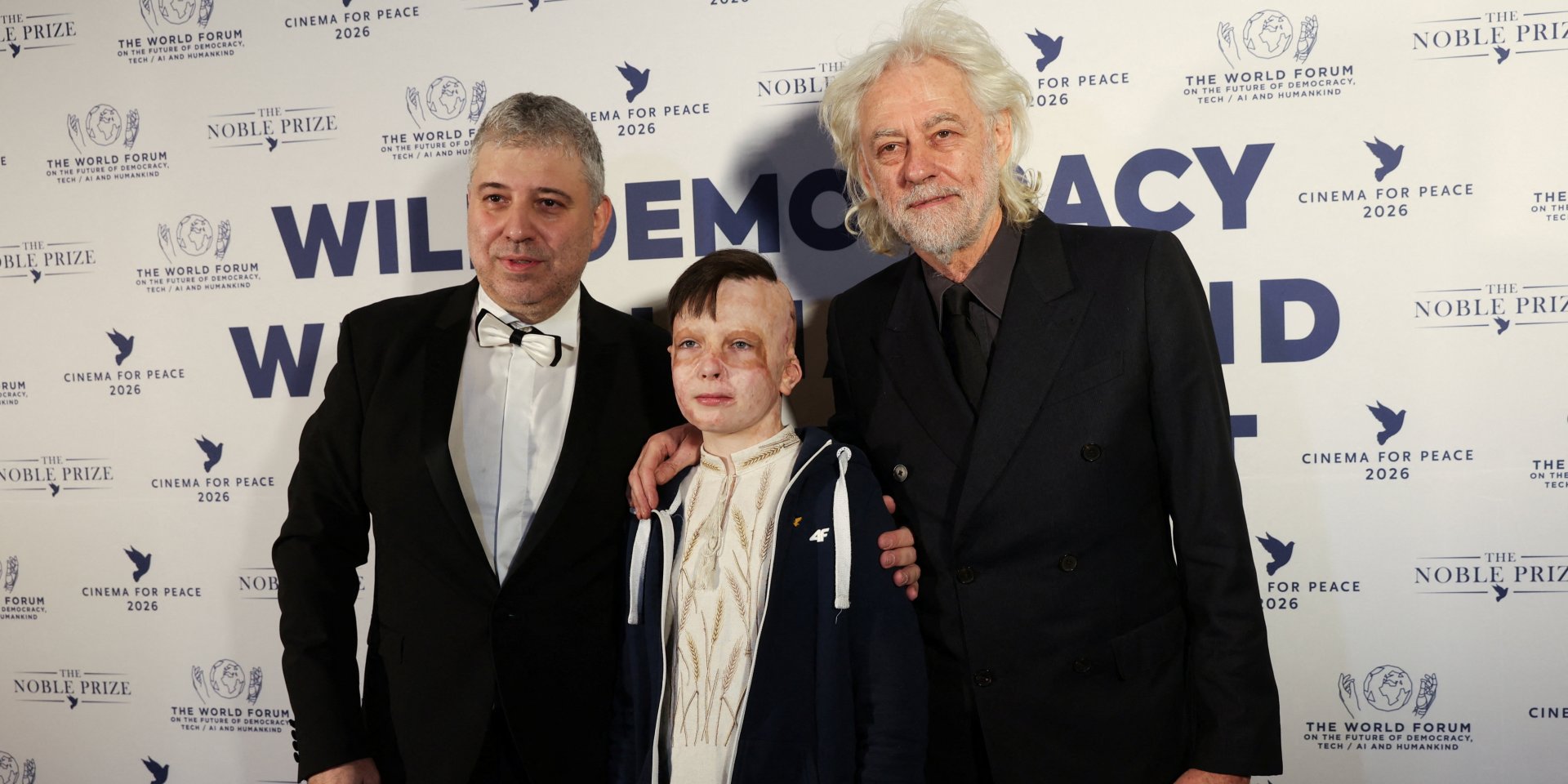 Евгений Афинеевский, Роман Олексив и Боб Гелдоф на гала-вечере Cinema for Peace (Фото: REUTERS/Maryam Majd)