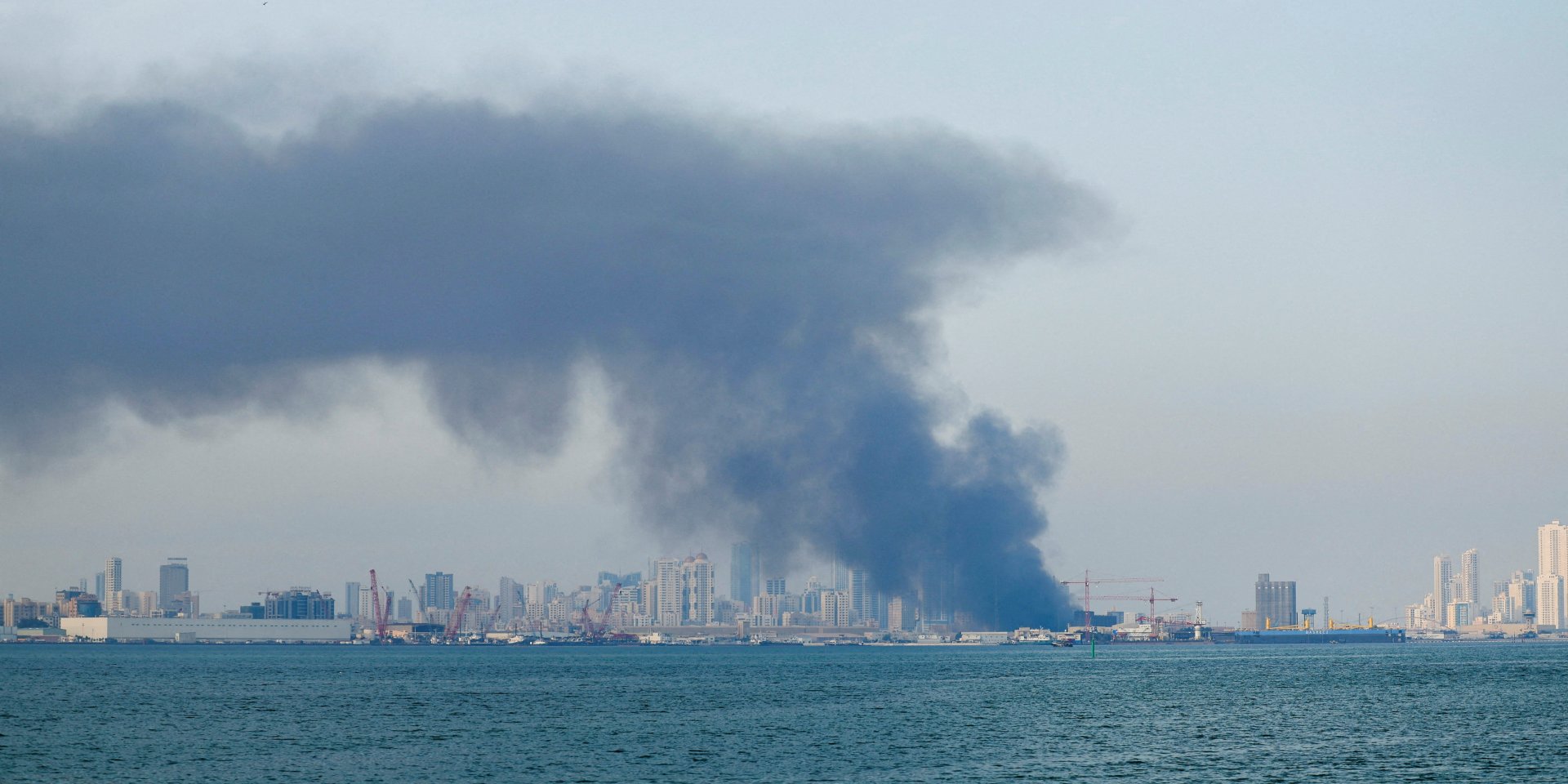 Smoke rises after reported Iranian missile attacks, following strikes by the United States and Israel against Iran, in Manama, Bahrain, February 28, 2026. (Photo: REUTERS/Stringer)