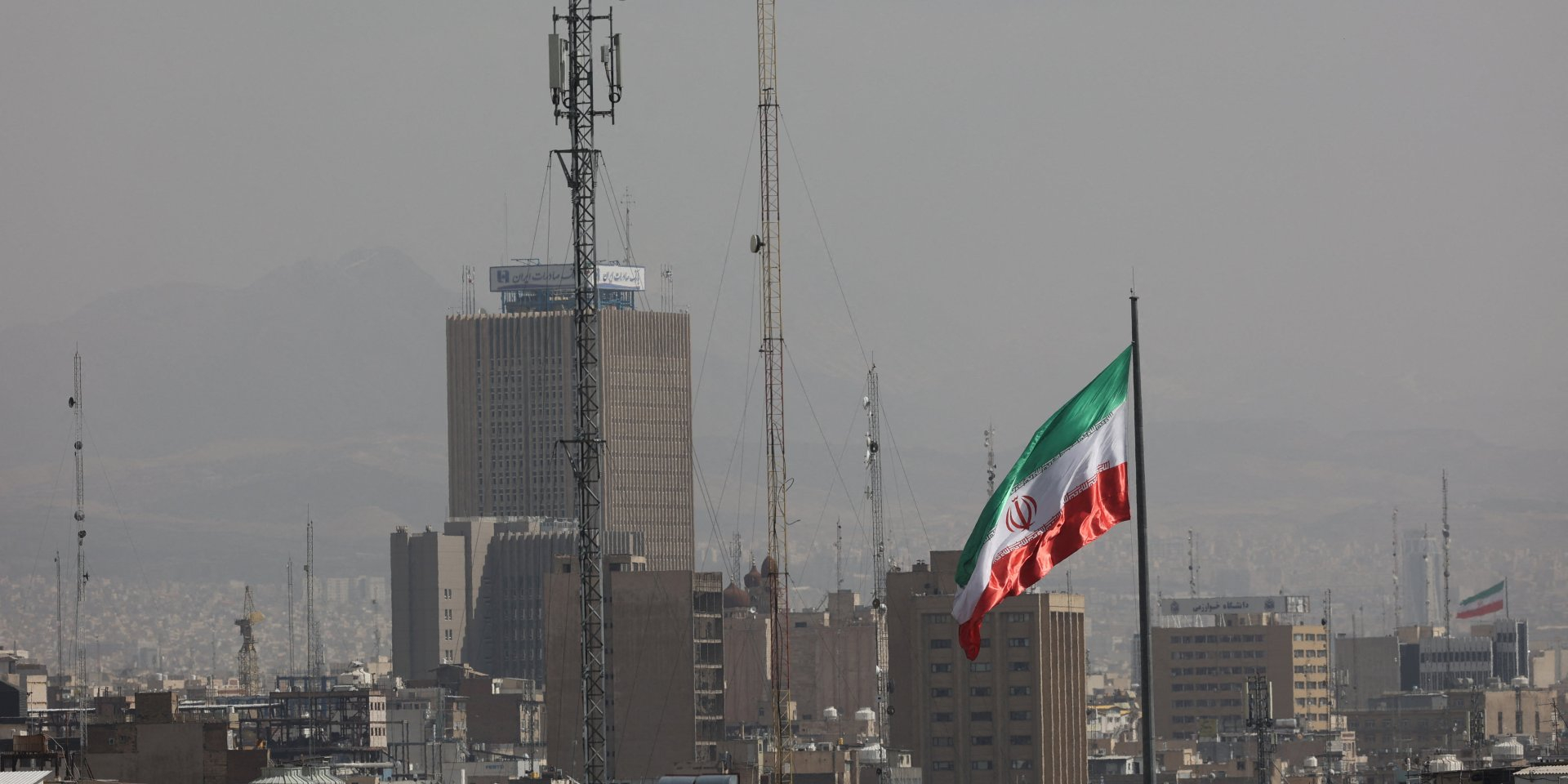 Iranian flags in Tehran on Feb. 28, 2026. (Photo: Majid Asgaripour/WANA (West Asia News Agency) via REUTERS)