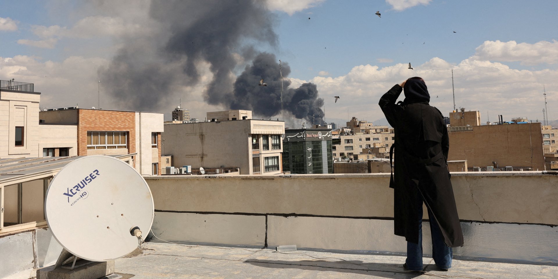 Smoke rises following an explosion, after Israel and the U.S. launched strikes on Iran, in Tehran, Iran, March 1, 2026. (Photo: Majid Asgaripour/WANA (West Asia News Agency) via REUTERS)