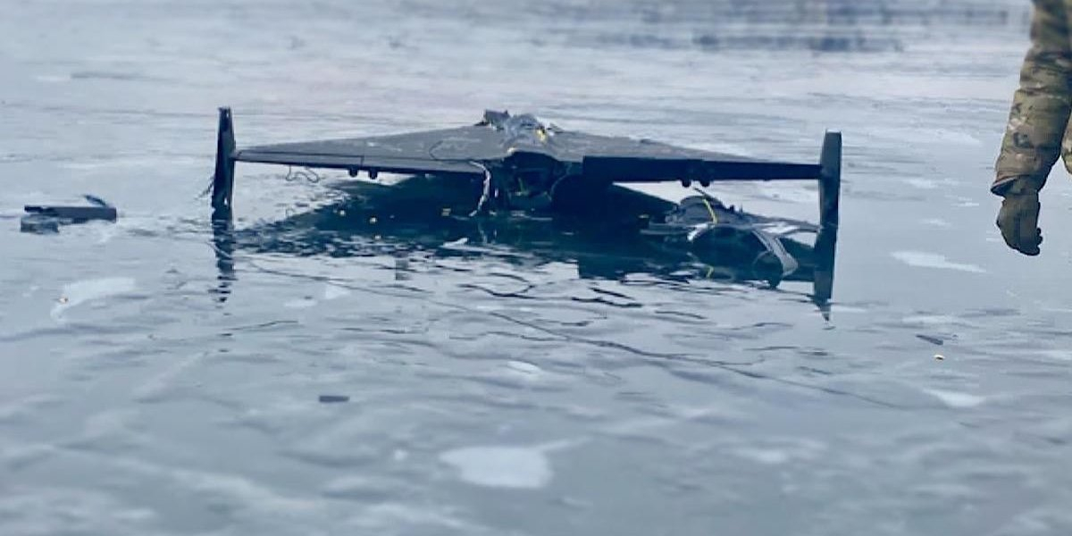 Russian UAV with a warhead on Dnipro ice, February 2026 (Photo: Ukraine's National Police / Telegram)