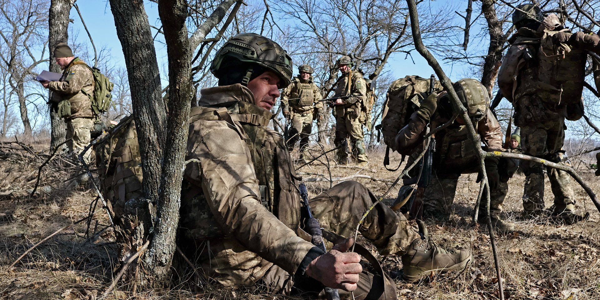 Recruits of the 65th Separate Mechanized Brigade rest after intensive training at a range in Zaporizhzhya Oblast. (Photo: Andriy Andriyenko/Ukraine's 65th Mechanized Brigade via AP)