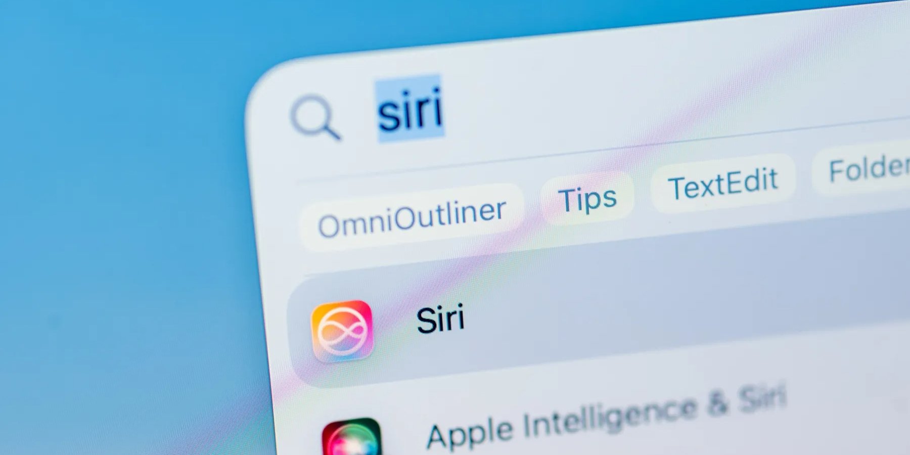 Іконка Apple Siri на ноутбуці Macbook Pro у магазині Apple у Сан-Франциско (Фото: Jason Henry/Bloomberg)
