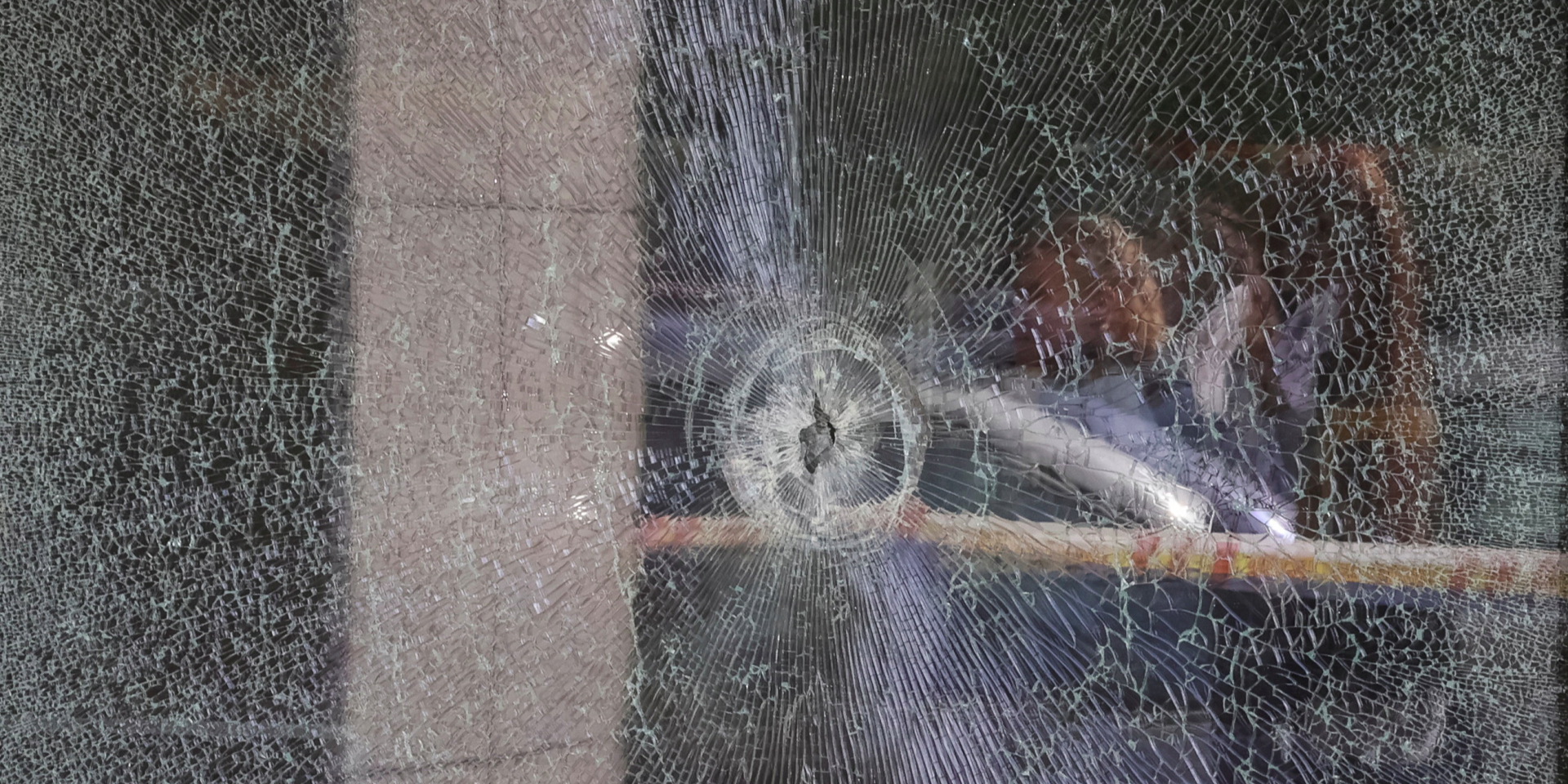 A bullet hole in the window of the Velmart store where a gunman took hostages on April 18 (Photo: REUTERS/Gleb Garanich)