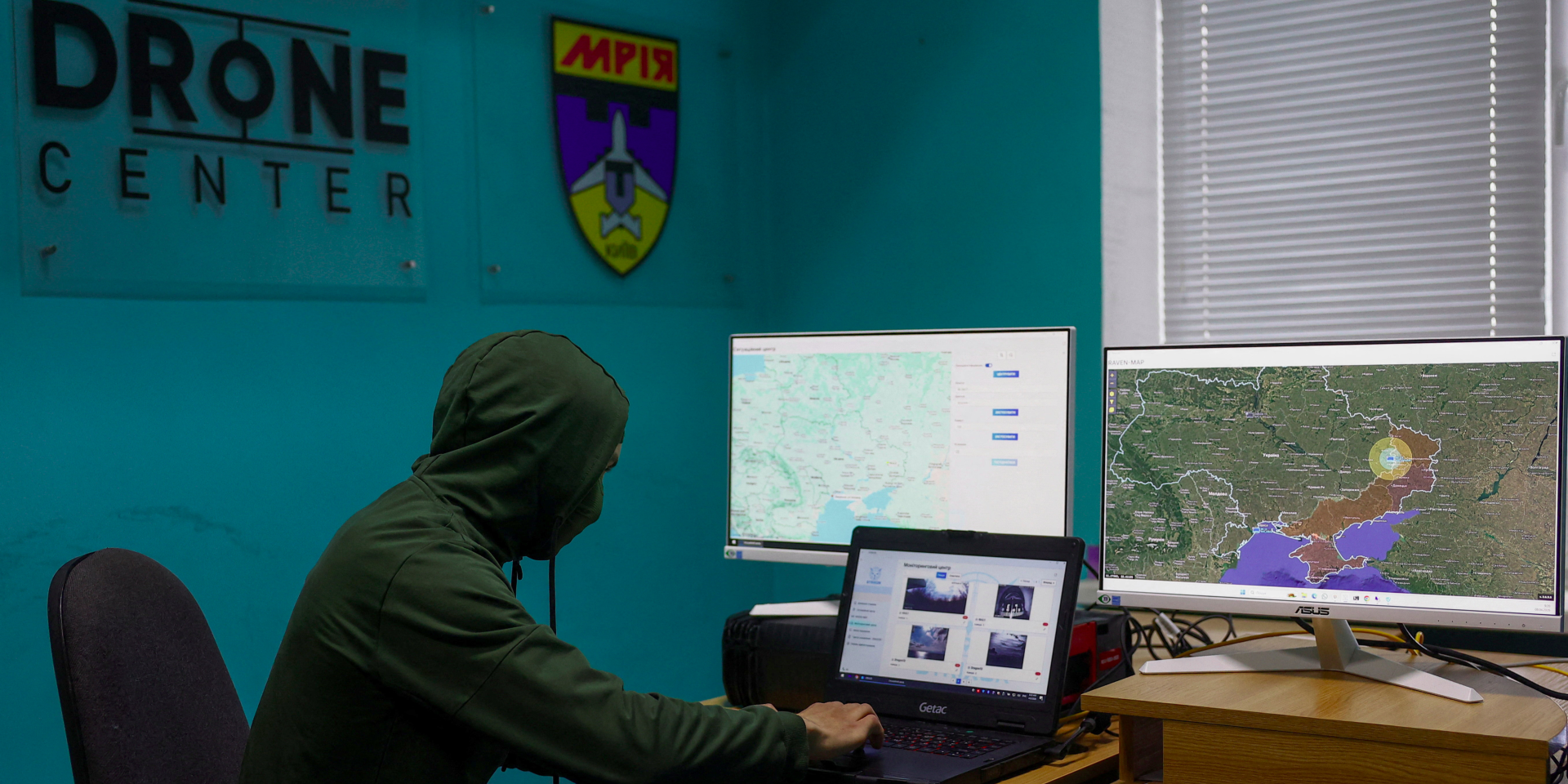 The worker of private security company shows the room where the enemy drones movement is being monitored, April 8, 2026 (Photo: REUTERS/Valentyn Ogirenko)
