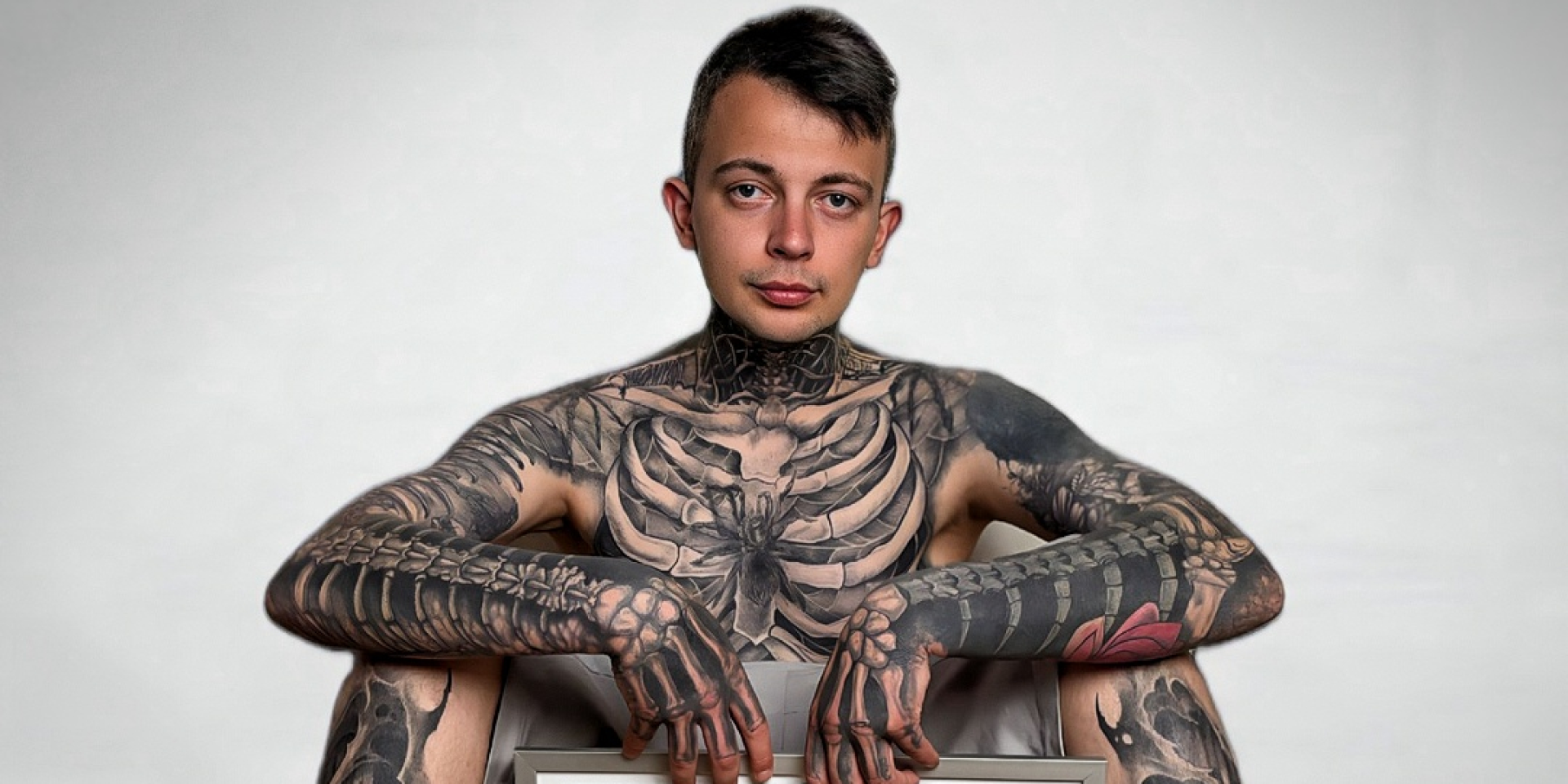 Ukrainian man breaks world record for bone tattoos