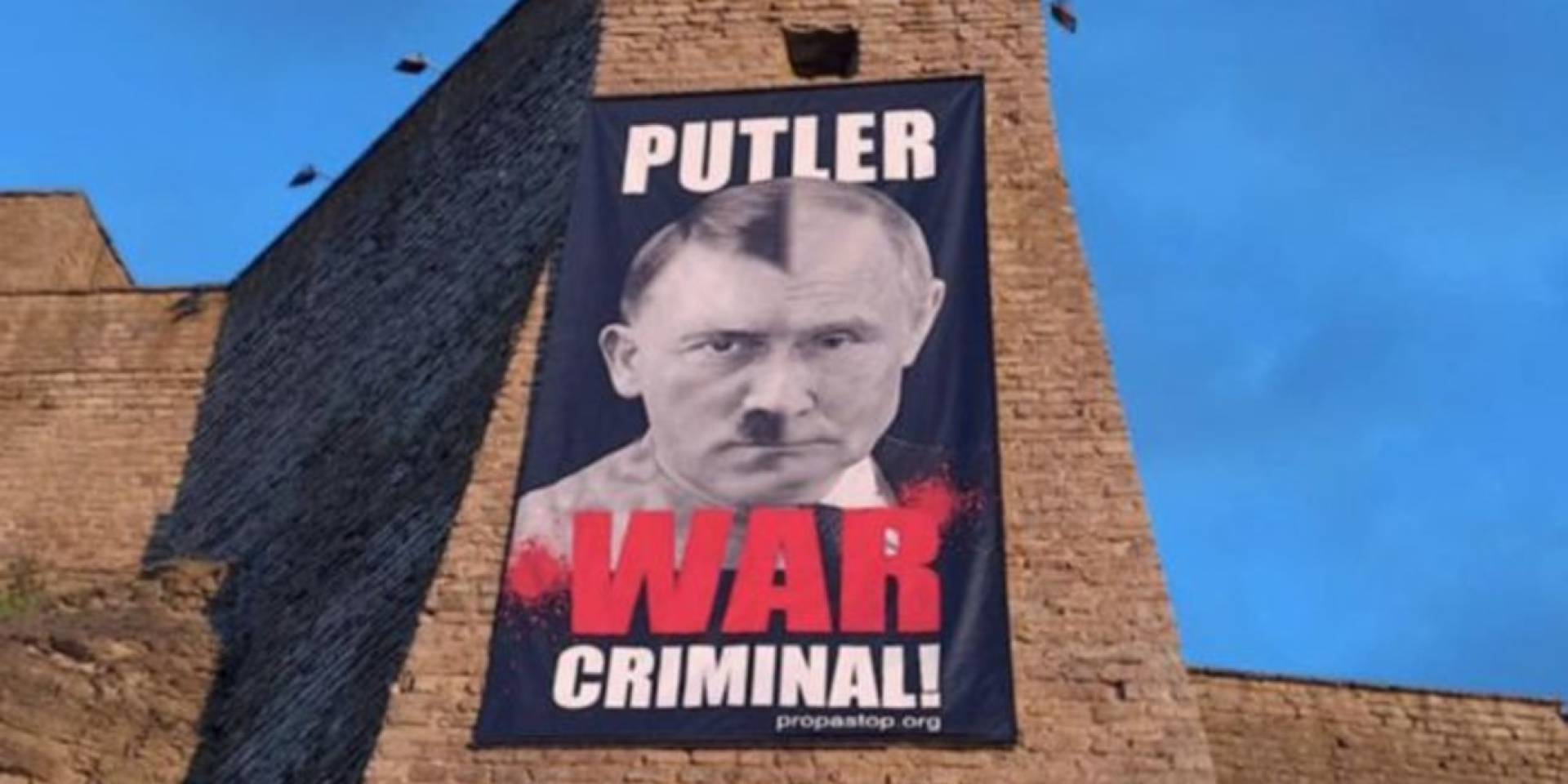 В эстонском городе Нарва 9 мая снова вывесят портрет Путина в образе Гитлера
