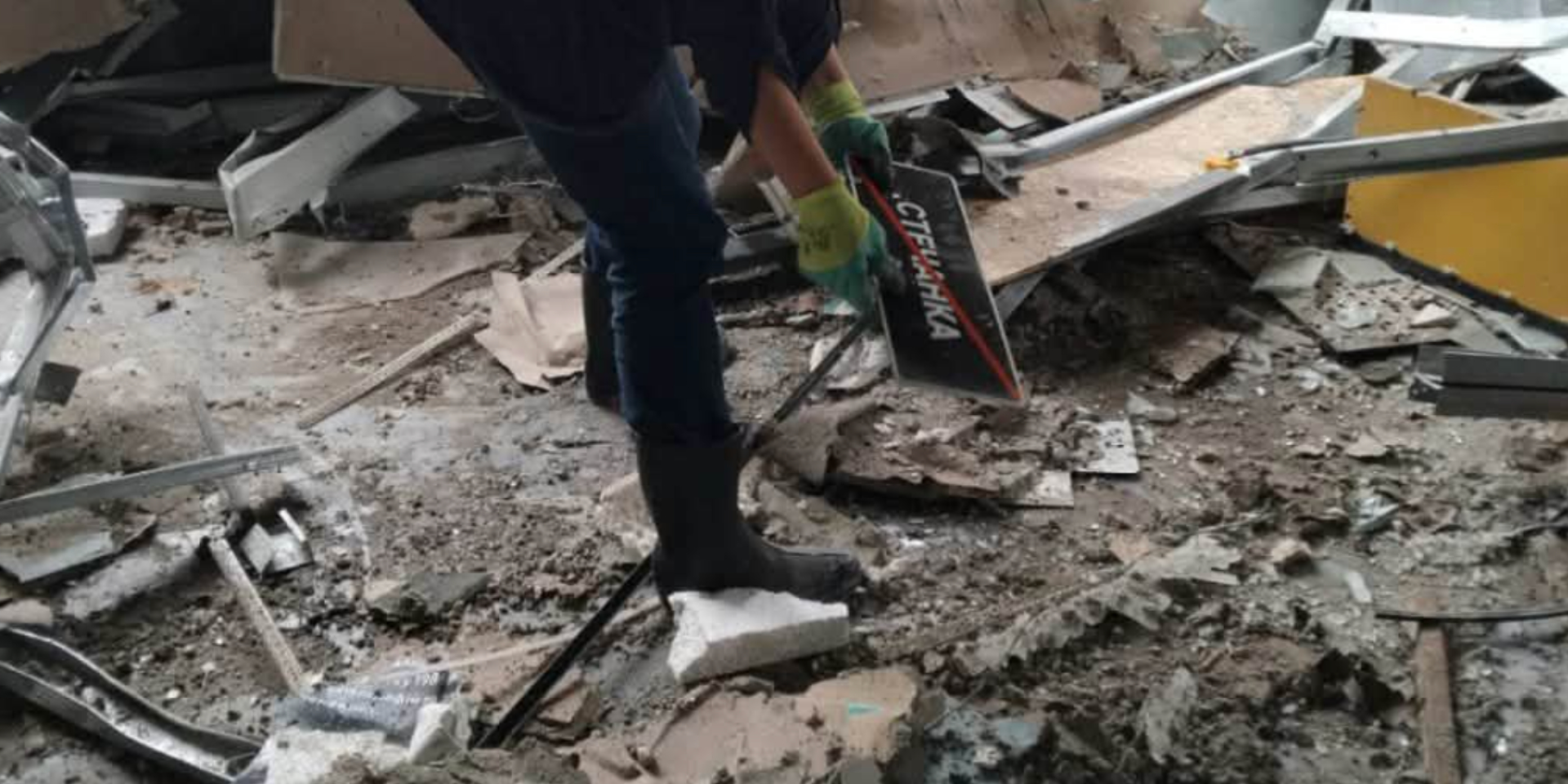 Museum workers recover artifacts from rubble after missile strike