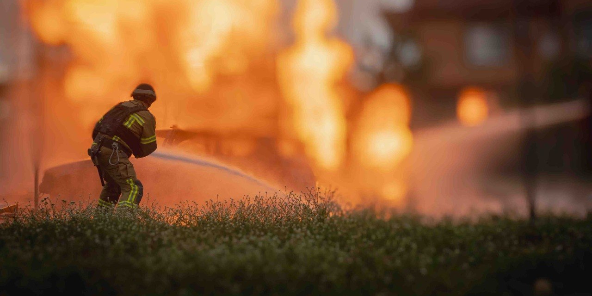 First responder extinguishes a fire following a Russian strike on a gas station in Sumy, July 5, 2026 (Photo: State Emergency Service of Ukraine/Telegram)