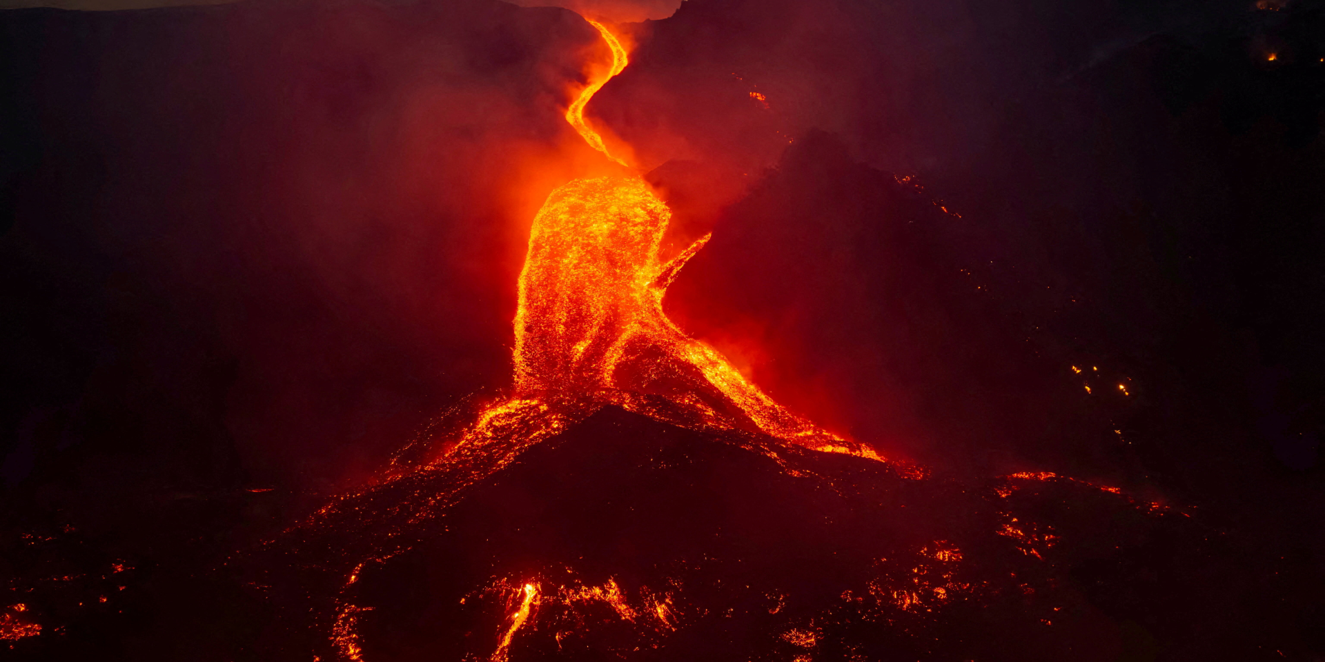 Molten lava flows down a slope during an eruption of Mount Etna in Sicily, Italy (Photo: Giuseppe Di Stefano/Etna Walk/via REUTERS)