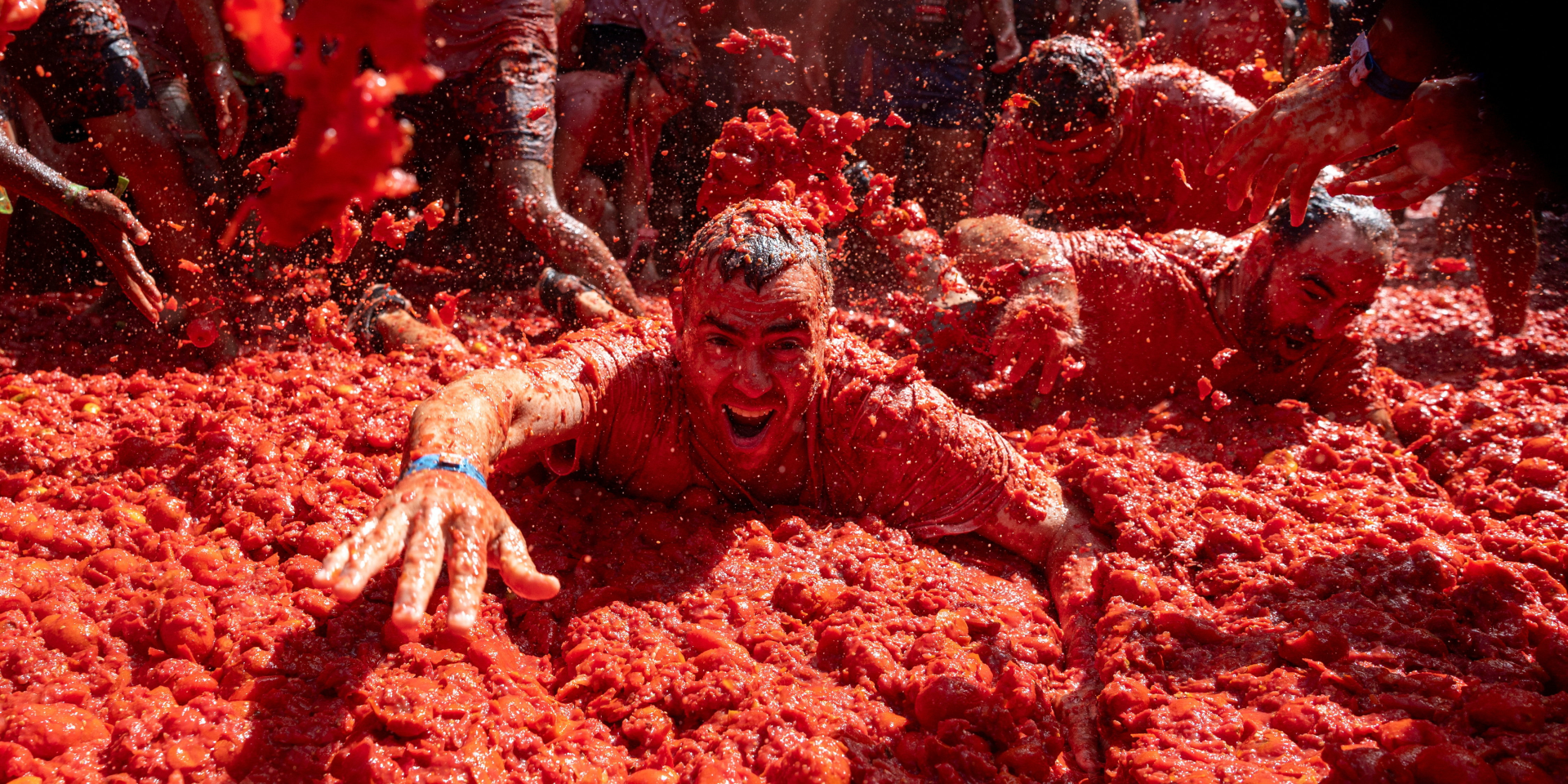 Фестиваль La Tomatina в Испании проходит уже много лет подряд (Фото: REUTERS/Thomas Peter)