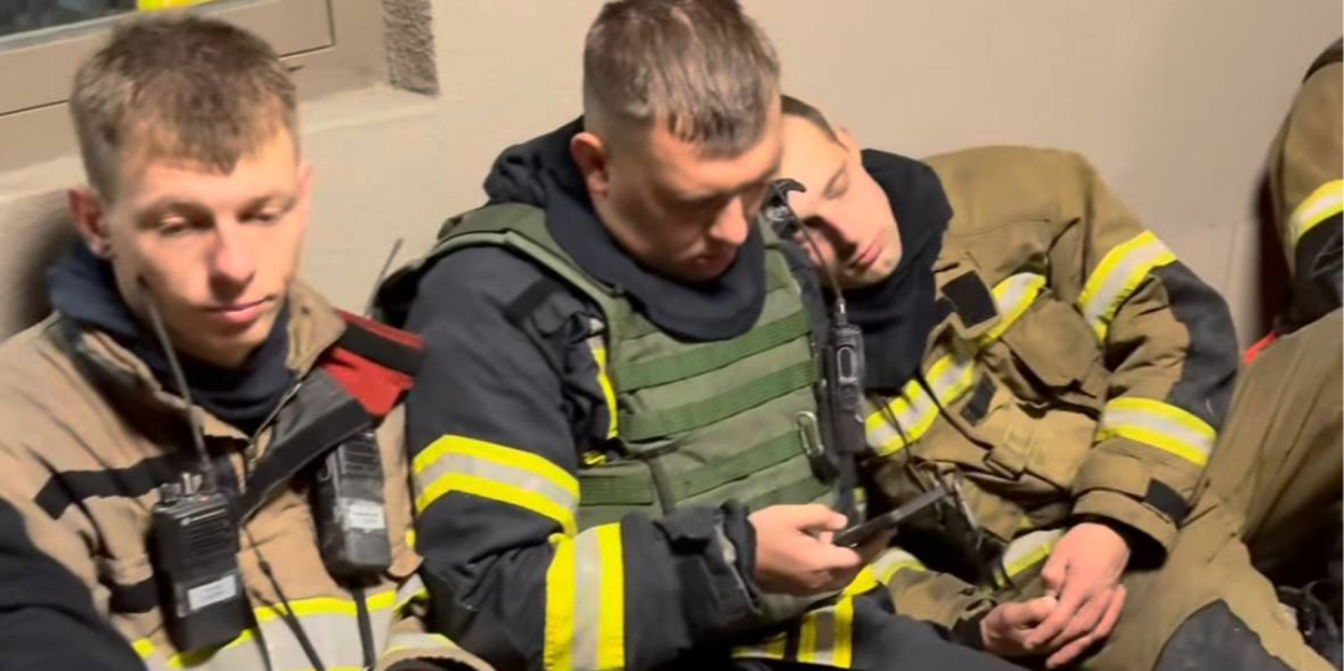 Rescuers in Kyiv rest during breaks between shellings. (Photo: powerful_fire_kyiv/Threads/screenshot)