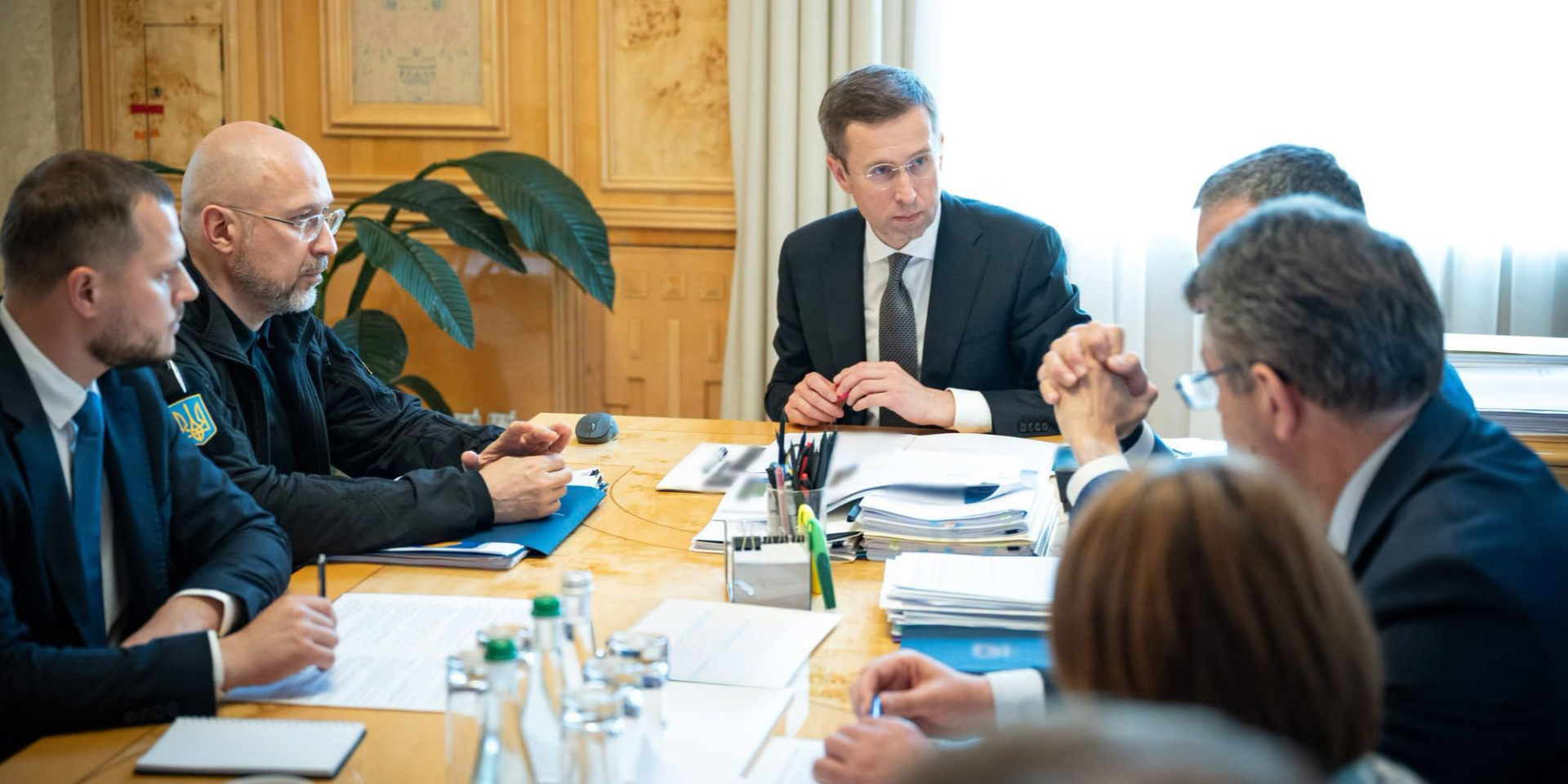 Prime Minister Serhiy Koretskyi (center) together with government representatives. (Photo: The Cabinet of Ministers of Ukraine)