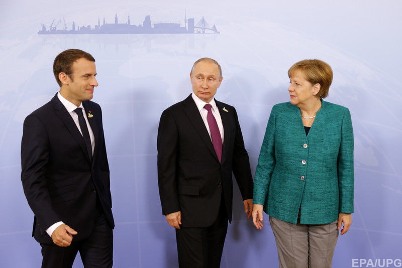  Встреча Меркель, Путина и Макрона на саммите G20 в Гамбурге в июле 2017 года