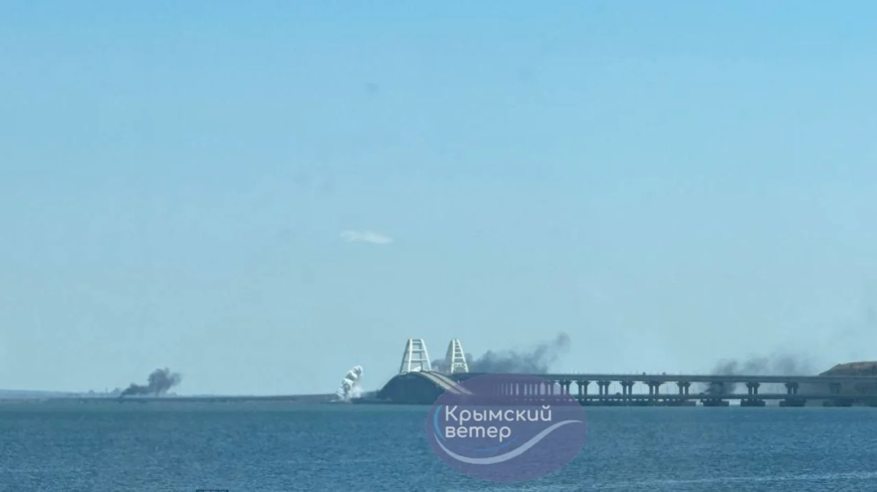 Crimea Bridge closed after explosions, wreathed in dense white