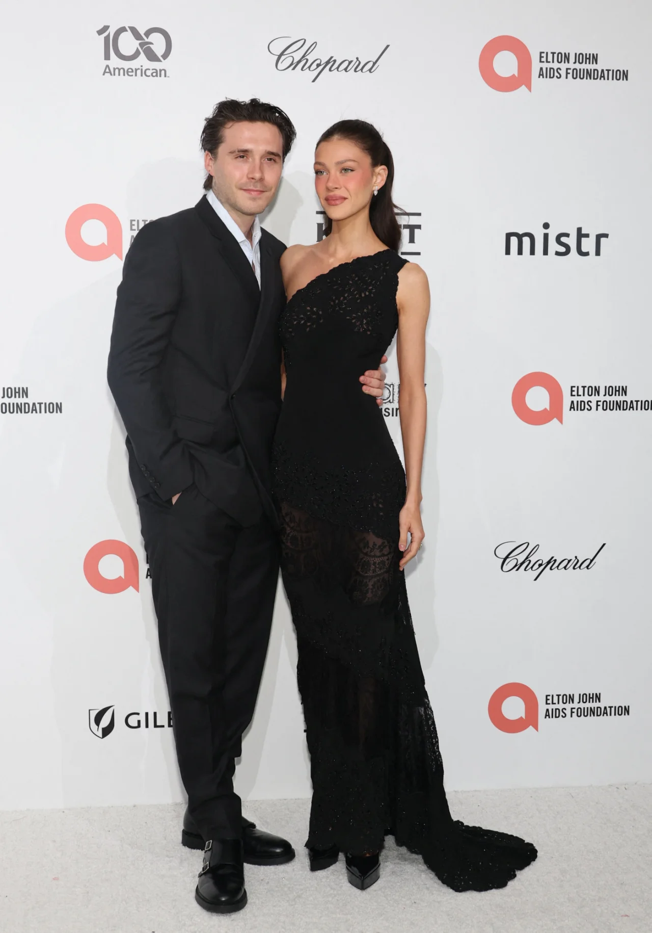 Бруклін Бекхем та Нікола Пельтц Бекхем на вечірці Фонду Елтона Джона (Фото: REUTERS/Aude Guerrucci)